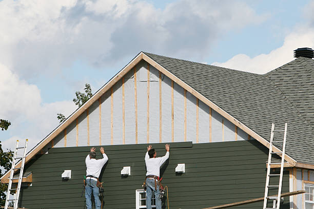 Professional Siding Contractor technician working in Potomac, MD